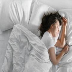 Lady asleep in bed